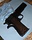 norinco_1911A1_broken_grip.jpg