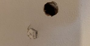 hole-in-door.jpg hole-in-door.jpg
