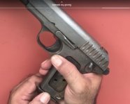 rolex pistol.jpg