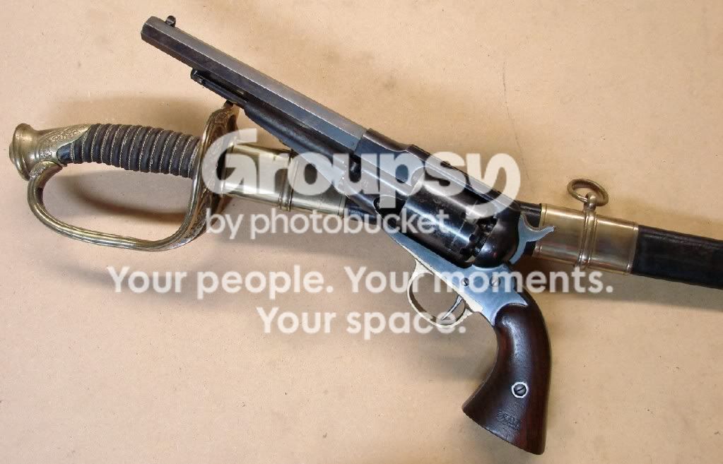 276kbsRemingtonArmyRevolverwith1850.jpg