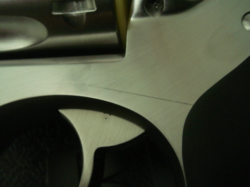 7.left_trigger_guard_frame_fit_gap_rear.JPG