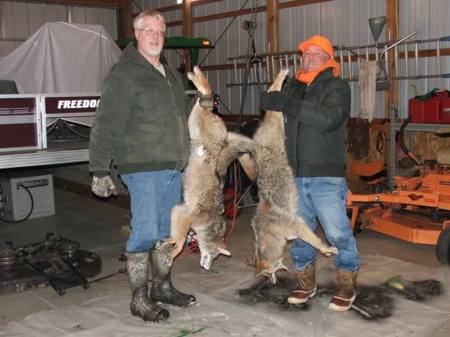 two-rednecks-with-dead-coyotes.jpg