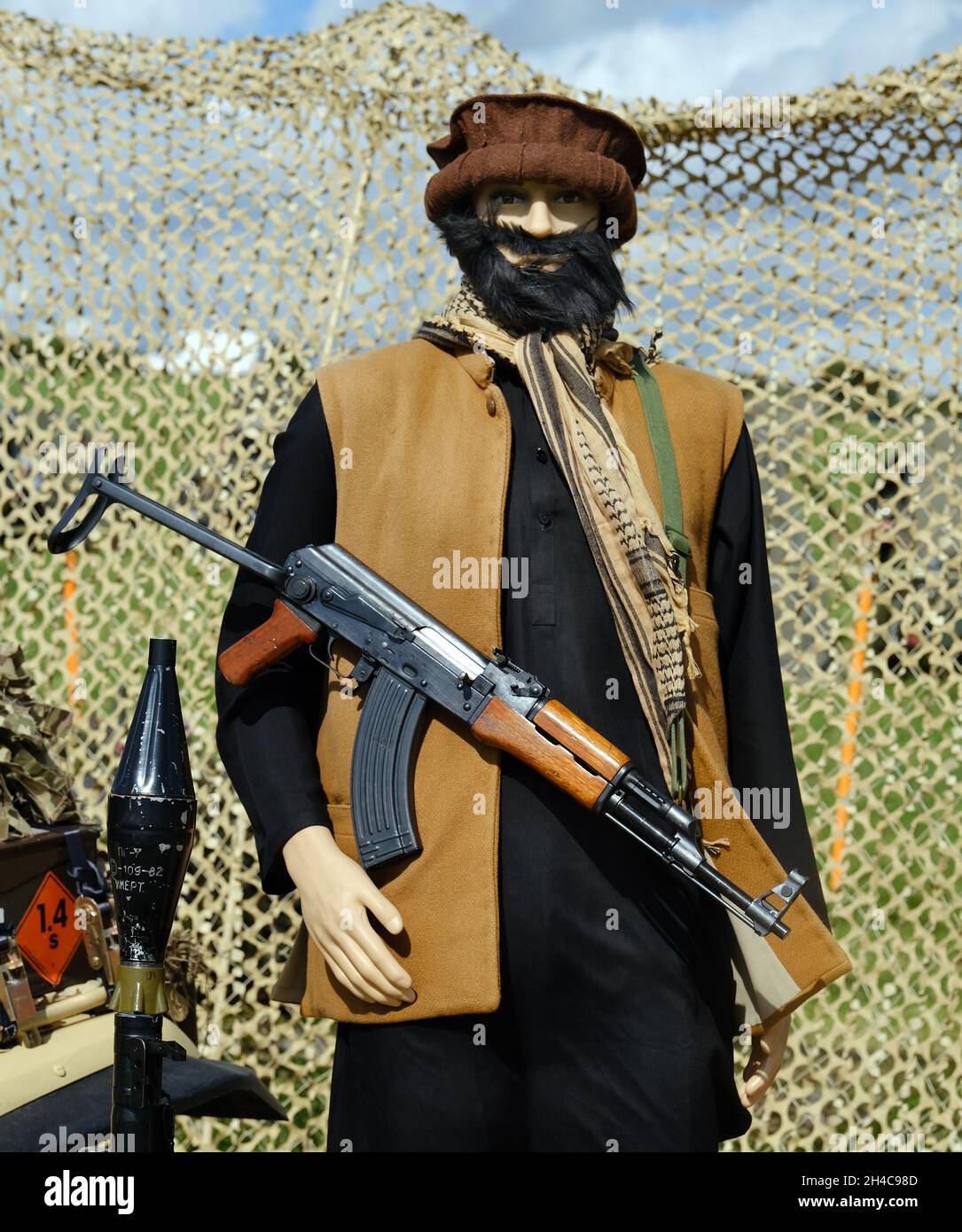 dummy-of-afgan-taliban-fighter-with-ak47-2H4C98D.jpg