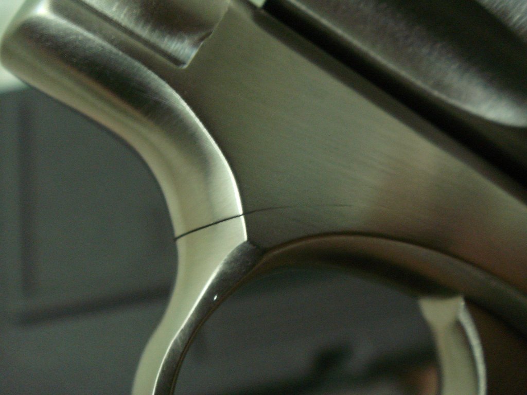 9.left_trigger_guard_frame_fit_gap_front_corner2.JPG