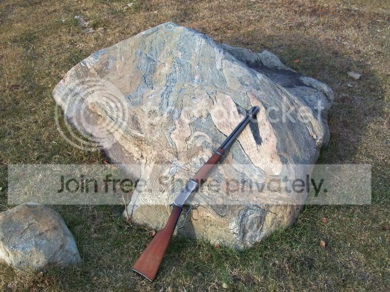 Rockandrifleax.jpg
